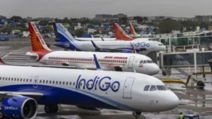 Air India and IndiGo airplanes at the airport terminal during flight delays