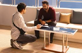 Director Ayan Mukerji with Hrithik Roshan and NTR Jr. on the sets of War 2