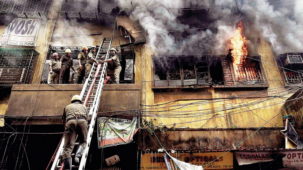 Firefighters trying to douse flames at Khidirpur Market, Kolkata
