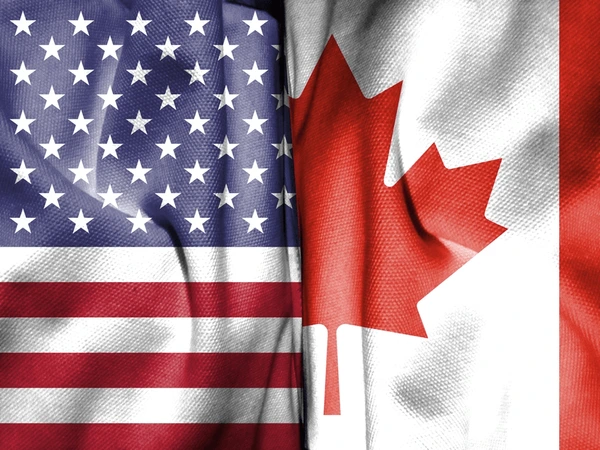 US and Canadian flags representing trade relations