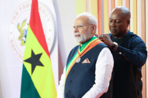 Narendra Modi with Ghanaian President receiving Officer of the Order of the Star of Ghana