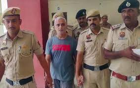 Uttar Pradesh Police arresting man involved in domestic crime