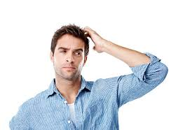 A confused person looking at workout charts