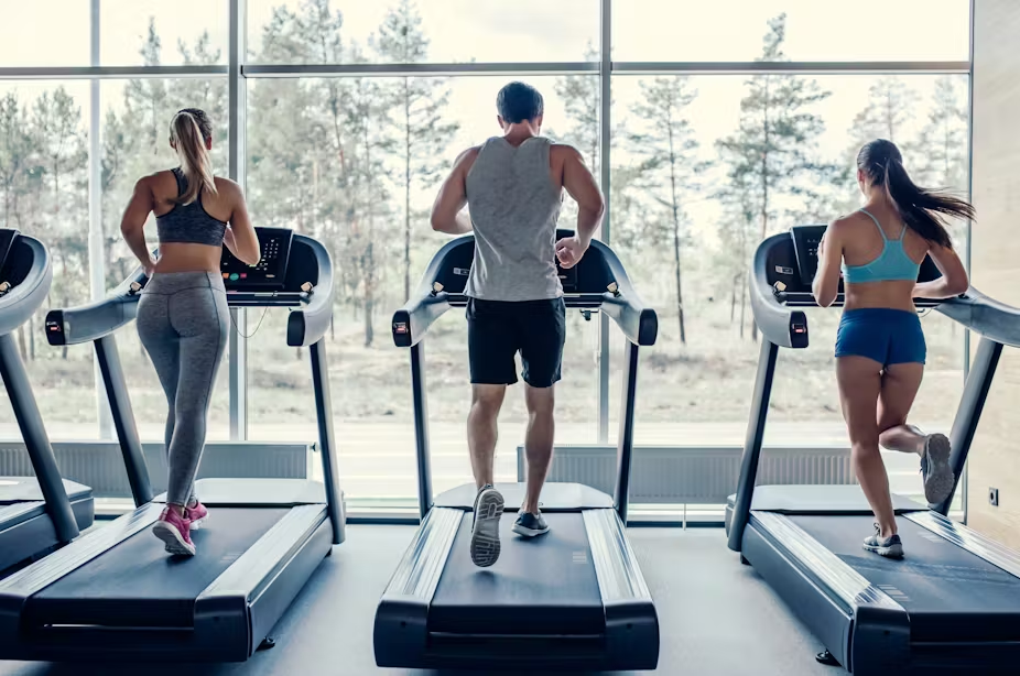 Person exercising in a gym setting.
