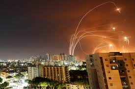 Ukrainian air defenses shooting down a drone over Kyiv.