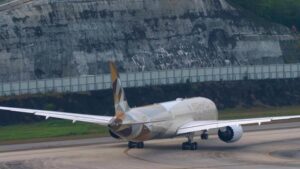 Etihad Airways Boeing 787 Dreamliner parked at an airport runwa